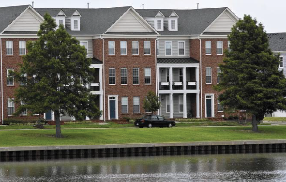 H2O town homes in Hampton: Delinquencies, a lawsuit and an auction